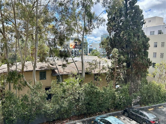 exterior space featuring uncovered parking