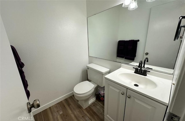 1920 S Mcclelland St Unit 27A, Santa Maria, CA 93454 - half bath with wood finished floors, toilet, vanity, and baseboards