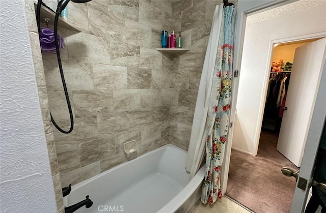 1920 S Mcclelland St Unit 27A, Santa Maria, CA 93454 - bathroom featuring a spacious closet and tiled shower / bath combo
