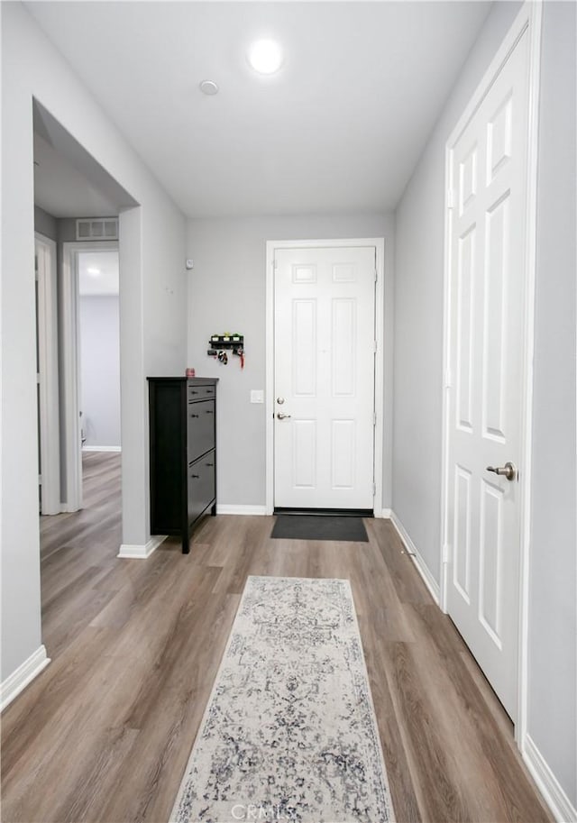 6335 Oldfield St, Lancaster, CA 93536 - entrance foyer with wood finished floors and baseboards