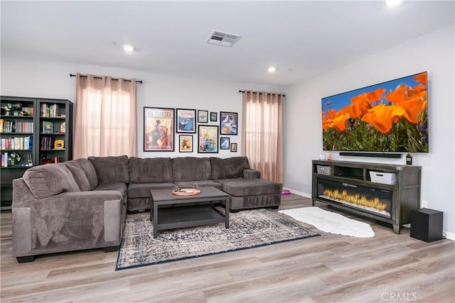 6335 Oldfield St, Lancaster, CA 93536 - living room with wood finished floors and recessed lighting