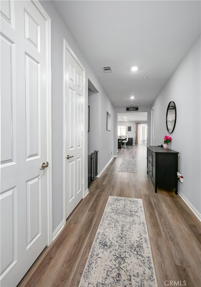 6335 Oldfield St, Lancaster, CA 93536 - corridor featuring wood finished floors and recessed lighting