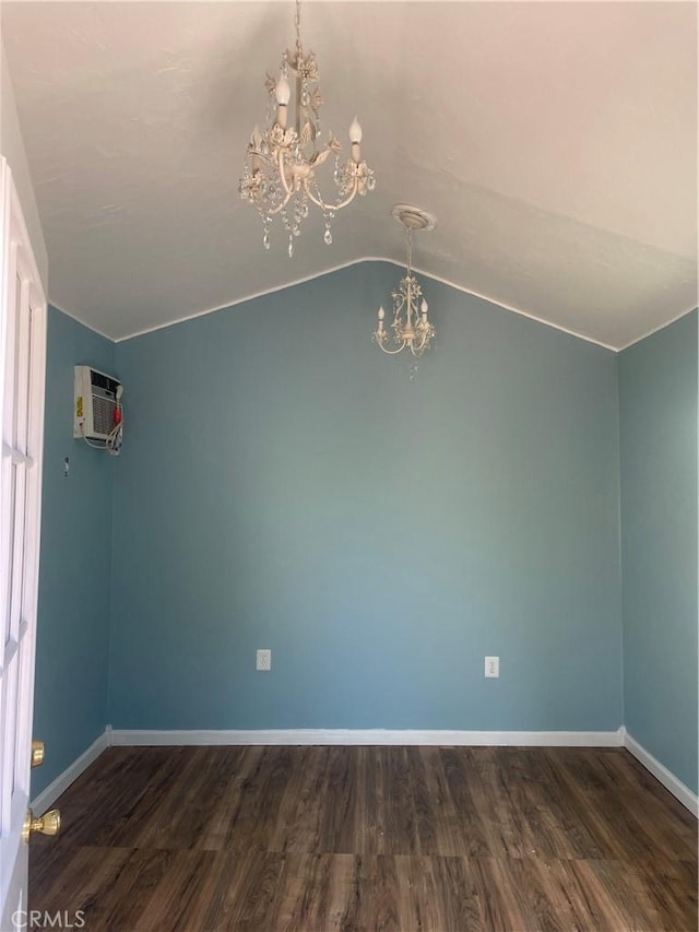8772 Mignonette St, Rancho Cucamonga, CA 91701 - unfurnished room with a chandelier, a wall mounted AC, wood finished floors, vaulted ceiling, and baseboards