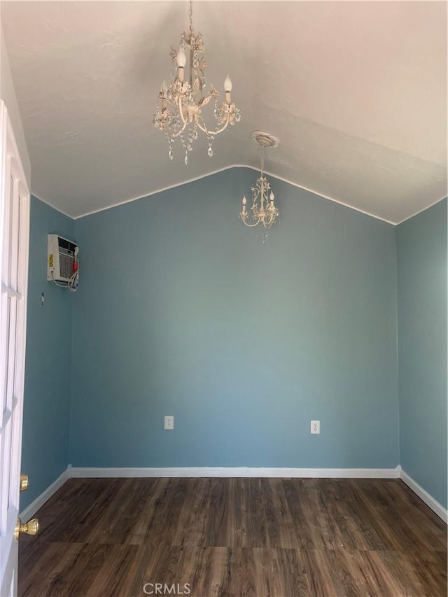 8772 Mignonette St, Rancho Cucamonga, CA 91701 - spare room with a chandelier, a wall mounted AC, wood finished floors, and lofted ceiling