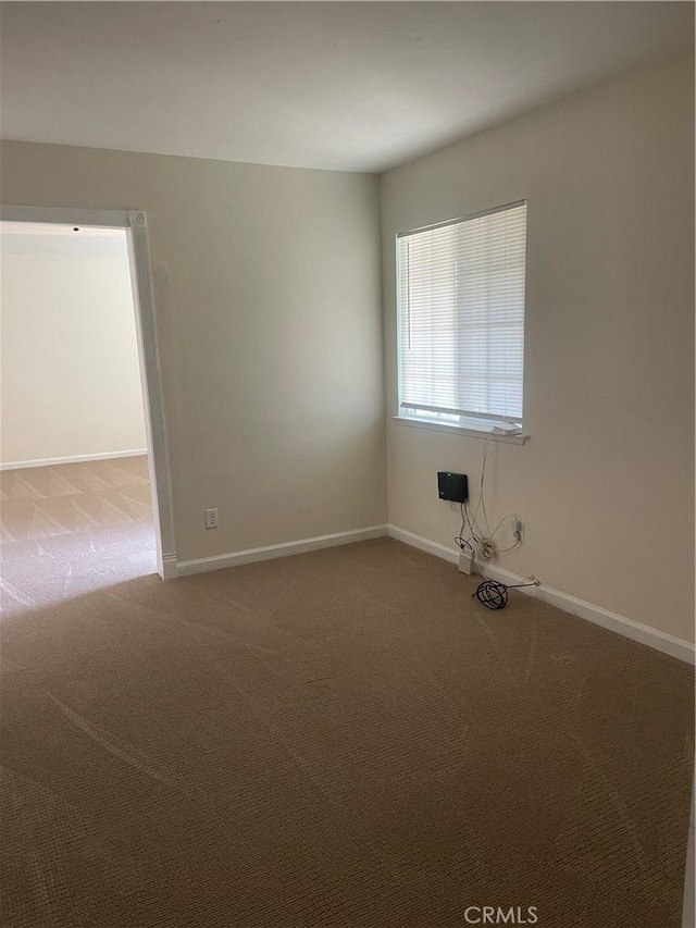 8772 Mignonette St, Rancho Cucamonga, CA 91701 - carpeted empty room with baseboards