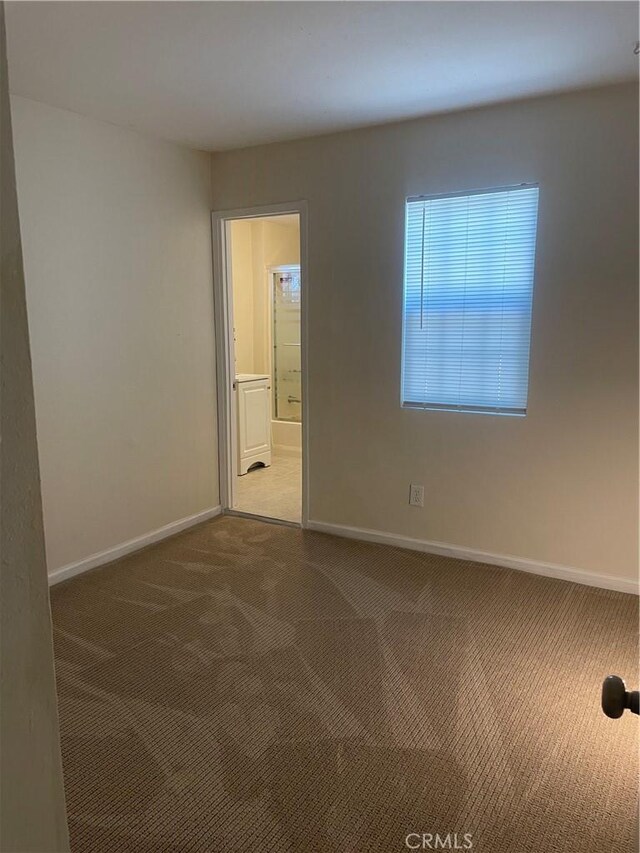 8772 Mignonette St, Rancho Cucamonga, CA 91701 - carpeted spare room featuring baseboards