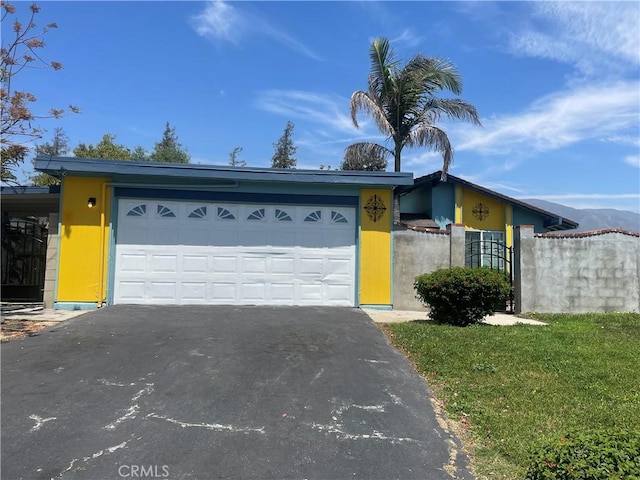 8772 Mignonette St, Rancho Cucamonga, CA 91701 - mid-century home with asphalt driveway and a garage