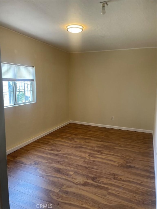 8772 Mignonette St, Rancho Cucamonga, CA 91701 - empty room with dark wood-type flooring and baseboards