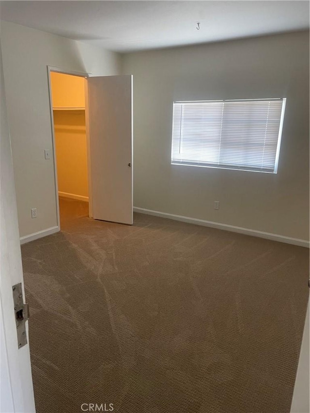 8772 Mignonette St, Rancho Cucamonga, CA 91701 - carpeted empty room with baseboards