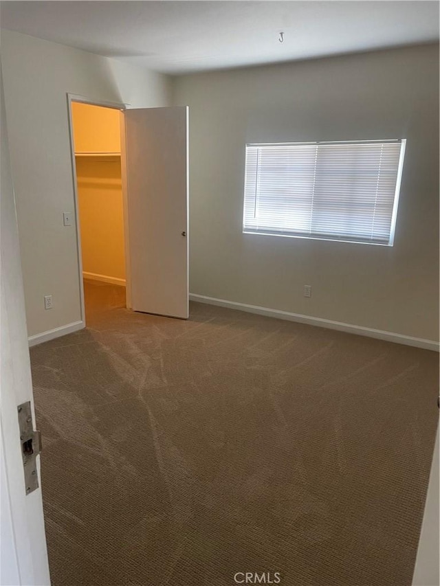8772 Mignonette St, Rancho Cucamonga, CA 91701 - carpeted empty room with baseboards