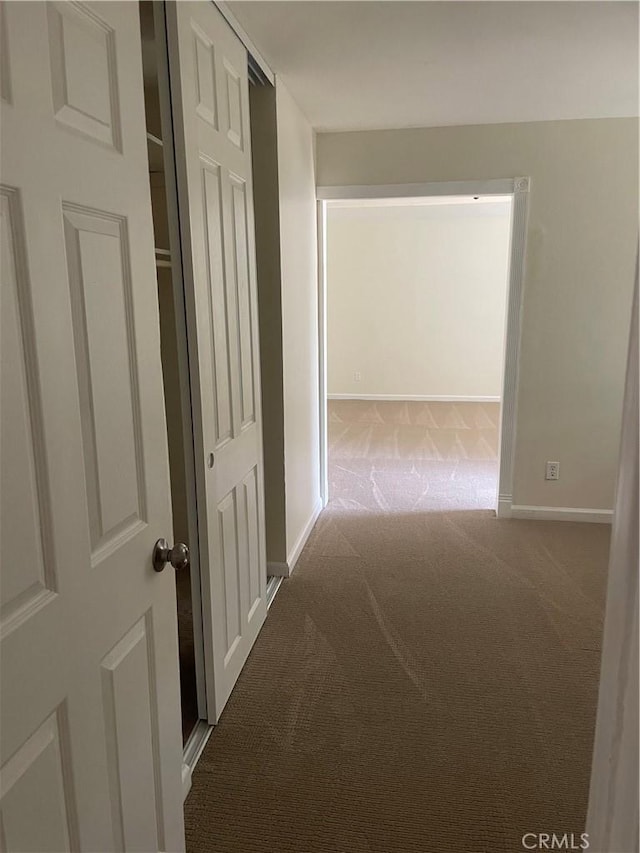 8772 Mignonette St, Rancho Cucamonga, CA 91701 - corridor featuring carpet flooring and baseboards