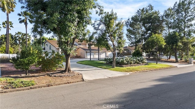 28863 Capano Bay Ct, Menifee, CA 92584 - view of property hidden behind natural elements with driveway