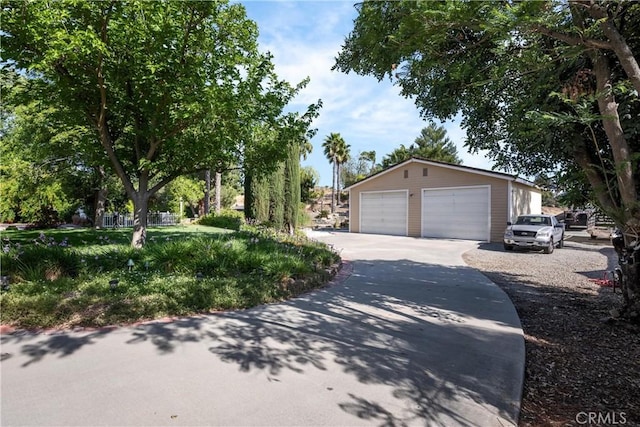 28863 Capano Bay Ct, Menifee, CA 92584 - view of front of property with a detached garage and an outbuilding