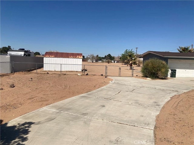 view of yard with a gate and fence