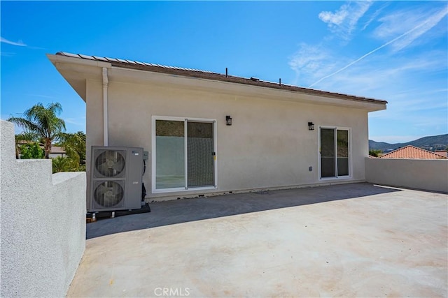 29847 Smugglers Point Dr, Canyon Lake, CA 92587 - back of property featuring a patio area and stucco siding