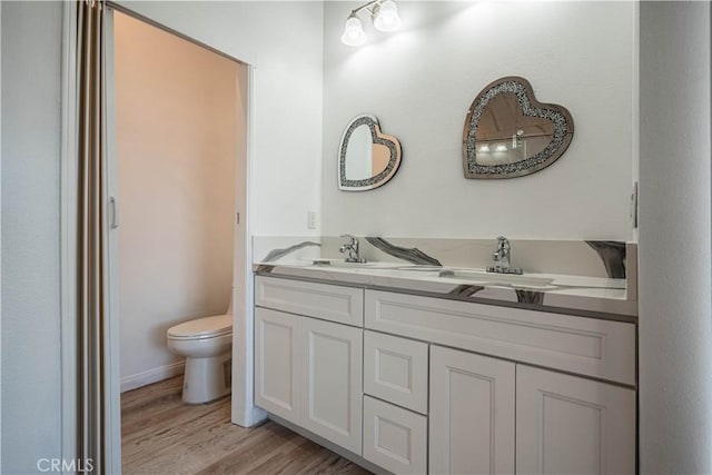 29847 Smugglers Point Dr, Canyon Lake, CA 92587 - bathroom featuring double vanity and wood finished floors
