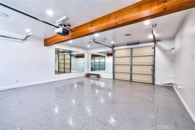 garage featuring baseboards and a garage door opener