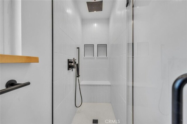 bathroom with a stall shower