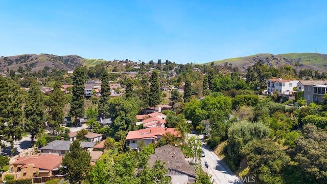 drone / aerial view with a mountain view and a residential view