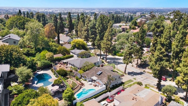 birds eye view of property with a residential view