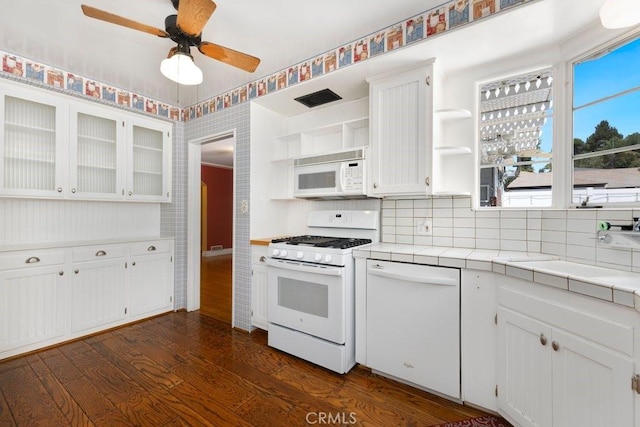 kitchen with tile countertops, dark wood finished floors, open shelves, and white appliances