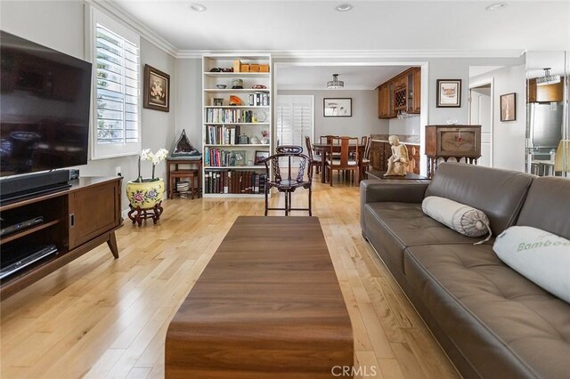 114 Via Estrada Unit B, Laguna Woods, CA 92637 - living room featuring light wood-type flooring, recessed lighting, and crown molding