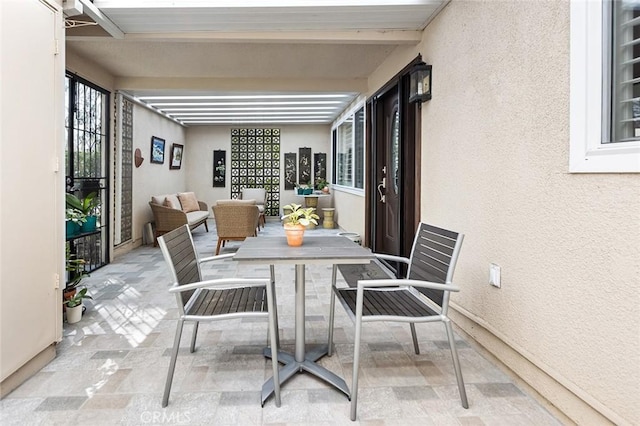 114 Via Estrada Unit B, Laguna Woods, CA 92637 - view of patio featuring an outdoor living space