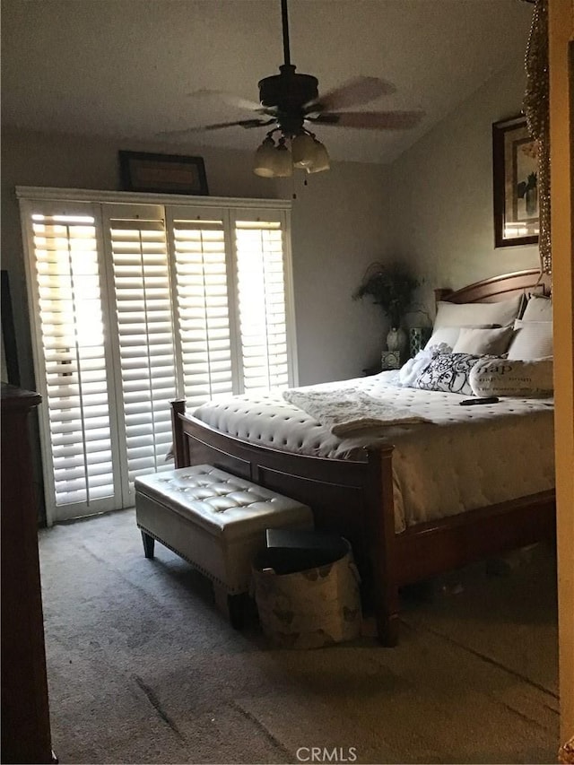 13919 Arthur Ave Unit 22, Paramount, CA 90723 - carpeted bedroom featuring lofted ceiling, a ceiling fan, and access to outside