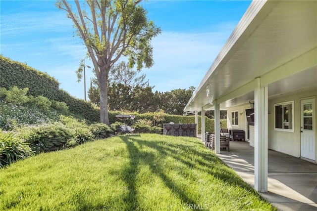 7293 Cirrus Way, West Hills, CA 91307 - view of green lawn with ceiling fan and a patio
