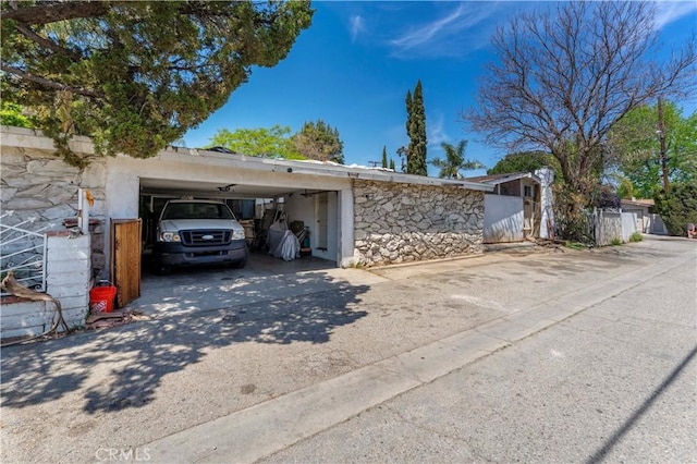 15023 Devonshire St, Mission Hills San Fernando, CA 91345 - exterior space featuring driveway and a carport