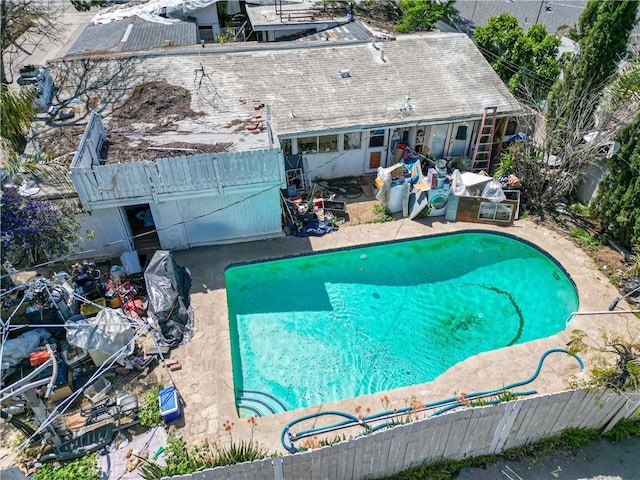 15023 Devonshire St, Mission Hills San Fernando, CA 91345 - view of swimming pool with a fenced in pool, fence, and a patio area
