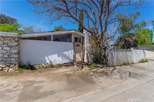 15023 Devonshire St, Mission Hills San Fernando, CA 91345 - view of outbuilding with fence and entry steps
