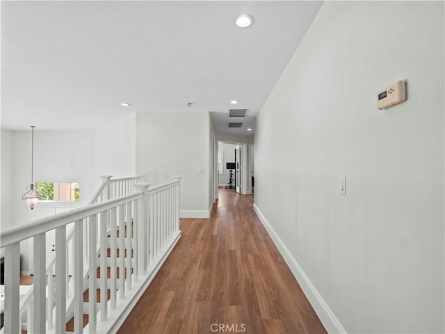 25626 Moore Ln, Stevenson Ranch, CA 91381 - hallway with wood finished floors, an upstairs landing, baseboards, and recessed lighting
