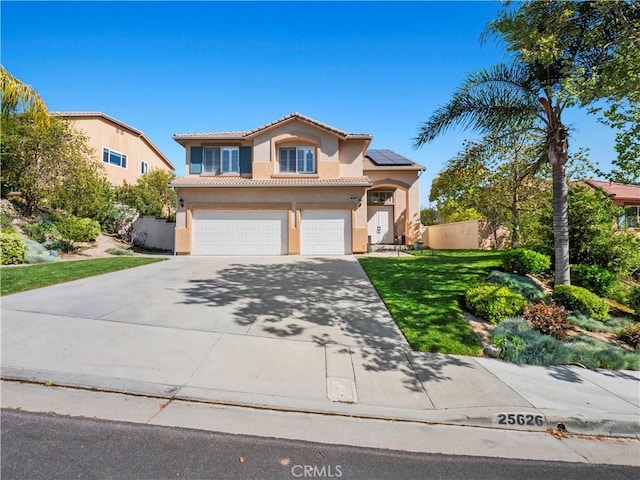 25626 Moore Ln, Stevenson Ranch, CA 91381 - mediterranean / spanish-style house with stucco siding, a garage, solar panels, and concrete driveway