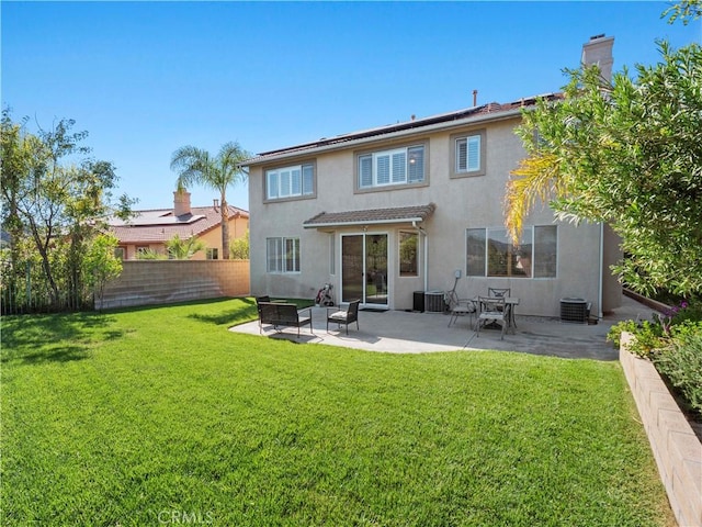 25626 Moore Ln, Stevenson Ranch, CA 91381 - back of property featuring stucco siding, central AC, and a patio area