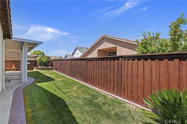 view of yard featuring a fenced backyard