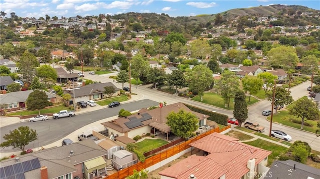 drone / aerial view featuring a mountain view and a residential view