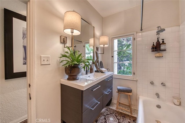 4912 Edgewood Pl, Los Angeles, CA 90019 - full bathroom featuring vanity, baseboards, and bathtub / shower combination