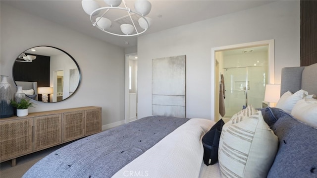 carpeted bedroom featuring ensuite bathroom and an inviting chandelier