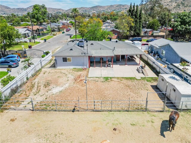 aerial view featuring a residential view and a mountain view