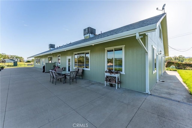 2260 Lakeshore Blvd, Upper Lake, CA 95485 - rear view of house with a patio and a chimney