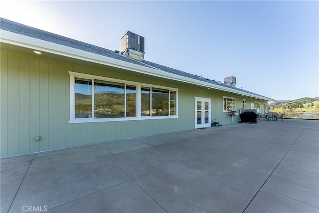 2260 Lakeshore Blvd, Upper Lake, CA 95485 - back of house with a patio area, french doors, and a chimney