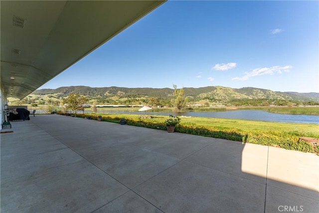 2260 Lakeshore Blvd, Upper Lake, CA 95485 - view of patio / terrace featuring a water and mountain view