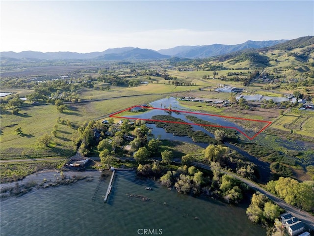 2260 Lakeshore Blvd, Upper Lake, CA 95485 - aerial view of property and surrounding area with property parcel outlined and a mountain backdrop