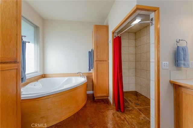 full bathroom with a garden tub, tile patterned flooring, and tiled shower