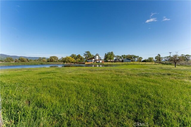 view of yard with a water view