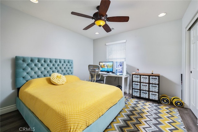 bedroom with recessed lighting, wood finished floors, a closet, and ceiling fan