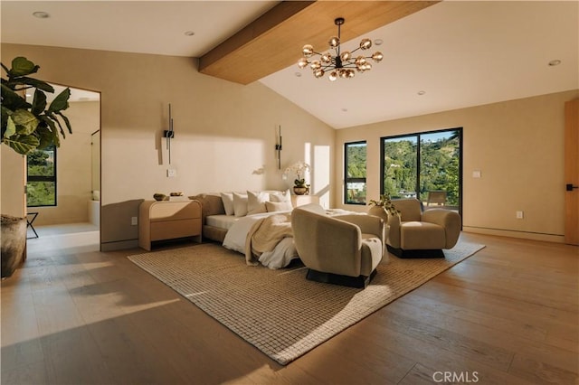 bedroom with lofted ceiling with beams, a notable chandelier, and hardwood / wood-style floors