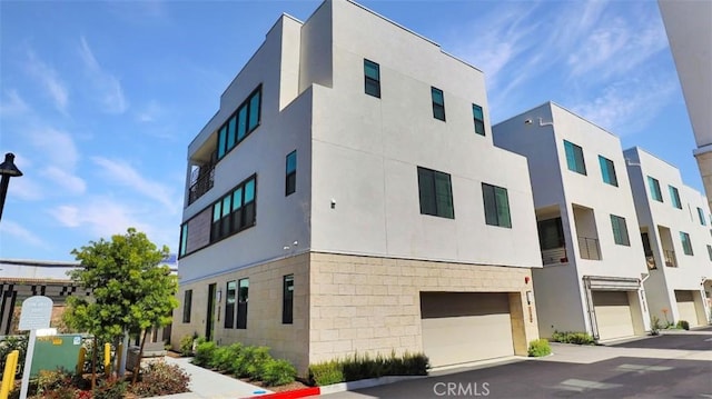 view of building exterior featuring an attached garage