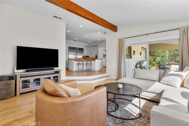 25174 Mulholland Hwy, Calabasas, CA 91302 - living room featuring light wood finished floors, recessed lighting, and beamed ceiling